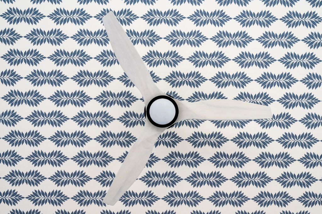 ceiling fan with patterned wallpaper