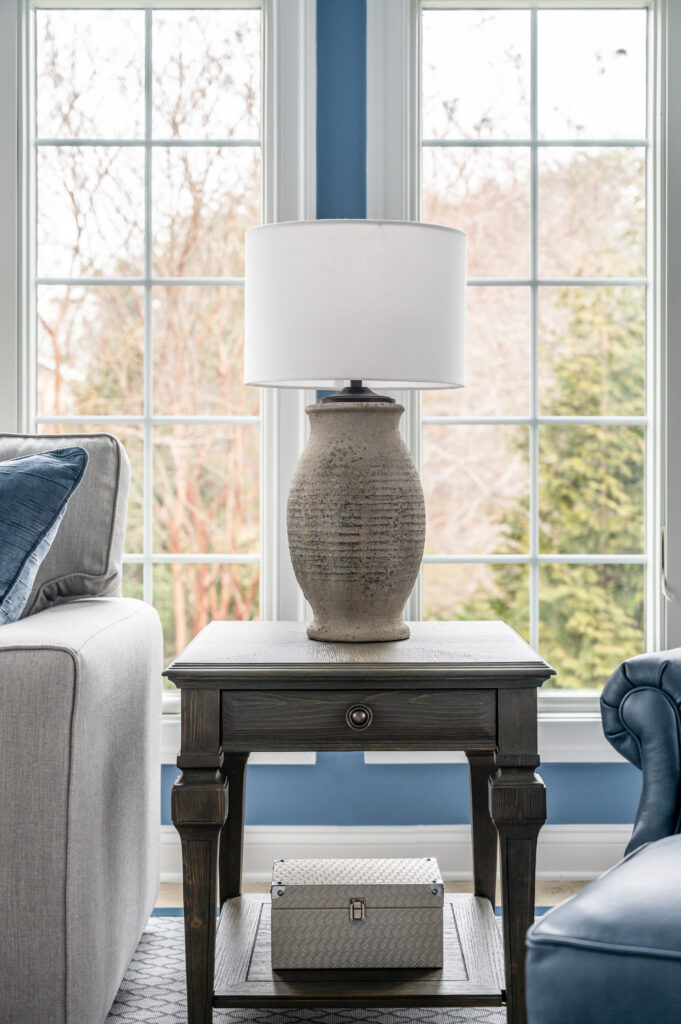 Large table lamp on table with decor