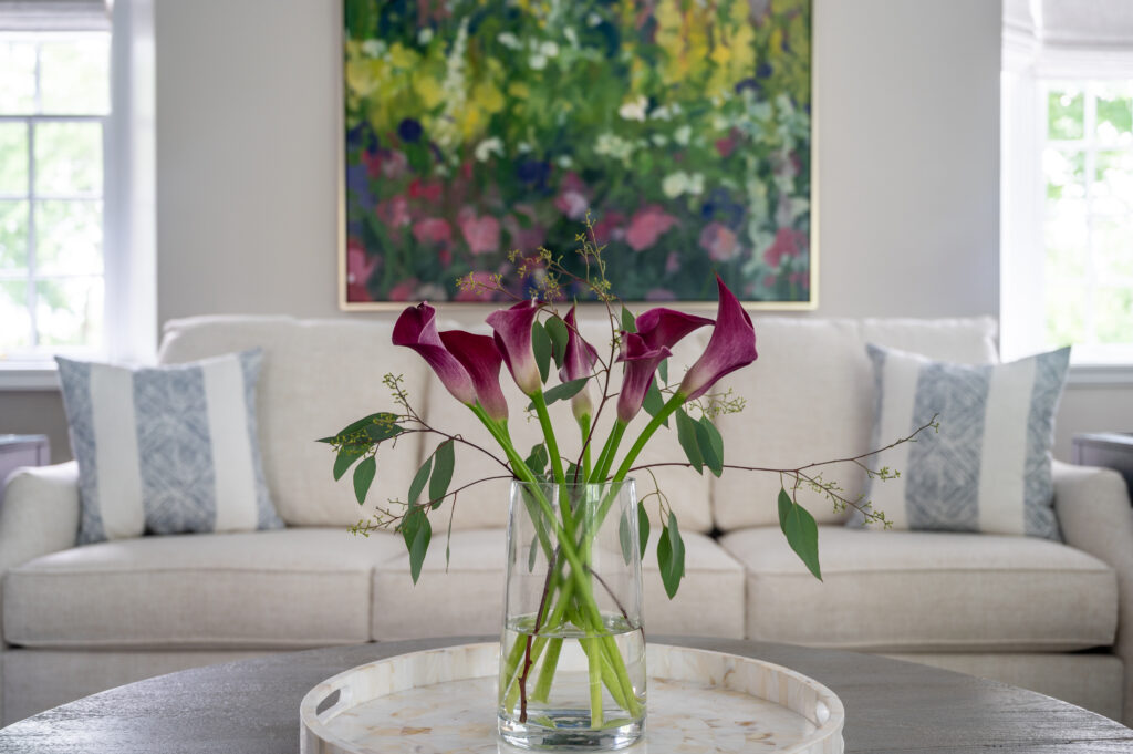 Floral arrangement and sofa