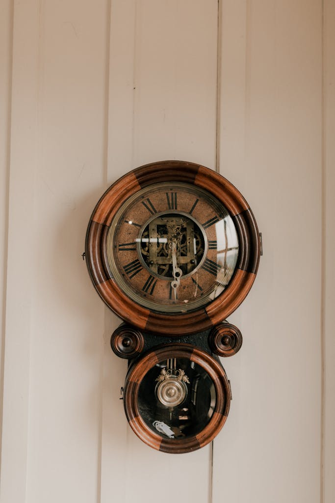 A clock hanging on the wall with a clock face