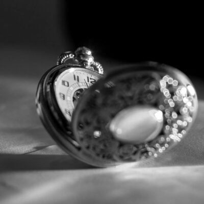 Grayscale Photo Of Pocket Watch