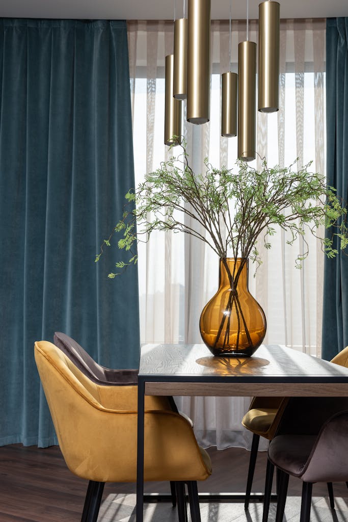 Stylish dining room featuring contemporary decor and sophisticated lighting.