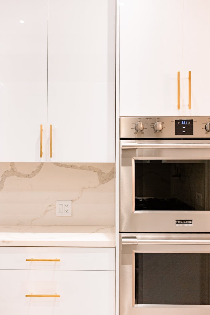 Elegant kitchen featuring sleek cabinetry and modern stainless steel appliances.